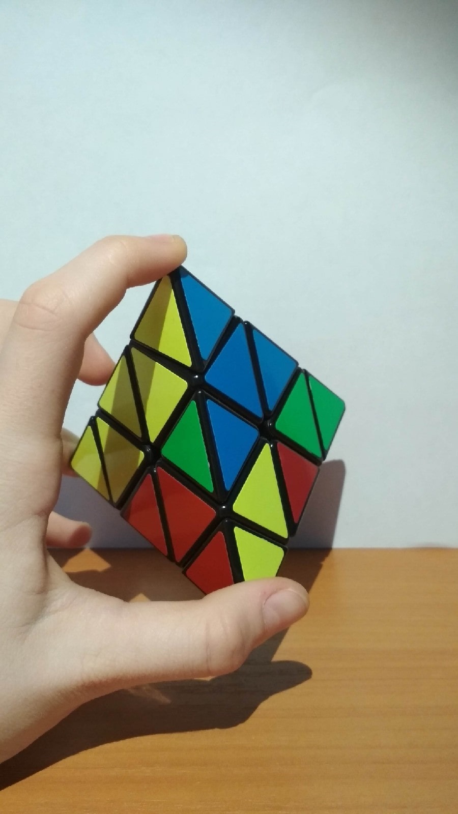 Как собрать треугольный кубик Рубика